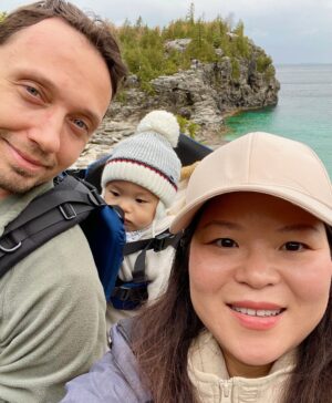 A family photo of the site creator, Thuy, Alex (her husband), and Adrian (her son).